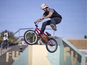 Jayde Cunningham performs a stunt at the 8th annual Bacon and Eggs BMX Jam at the Forest Glade skatepark, Sunday, September 25, 2016.