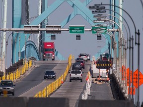 Concrete barriers between traffic and the curb can be seen on the Ambassador Bridge, Sunday, Sept. 4, 2016. The barriers are in place due to an emergency directive from Transport Canada after the agency found safety deficiencies on the Canadian side of the bridge.