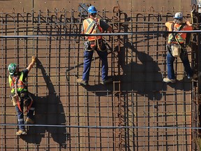 Workers are shown at a construction site for a University of Windsor project in downtown Windsor on Monday, Sept. 12, 2016 near the site of the former Armouries.