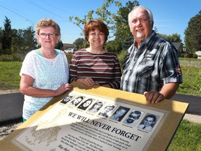 The 50th anniversary of the bus crash in Oldcastle that killed eight children is approaching. The families of some of the victims are planning a weekend of "homecoming" events to remember the victims. Cheryl Leithead-Skilton, left, Wendy Pulleyblank-Cunningham and Chris O'Neil stand next to the memorial site near Walker Road and Highway 3 where the accident occurred.