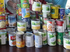 Canned goods gathered for a food drive are shown in this 2011 file photo.