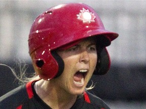 (file) Canada's Ashley Stephenson reacts after scoring during fifth inning women's baseball action against Venezuela at the Pan American Games in Toronto on Saturday July 25, 2015.