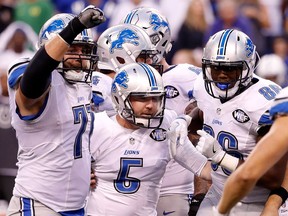 Matt Prater (5) of the Detroit Lions celebrates with teammates after kicking the game-winning field goal in the fourth quarter against the Indianapolis Colts at Lucas Oil Stadium on Sept. 11, 2016 in Indianapolis, Ind.