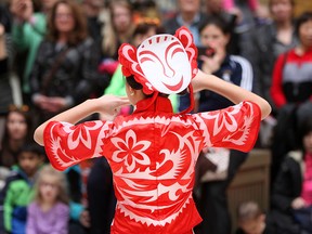 A young dancer with the Essex County Chinese Canadian Association performs at a Chinese New Year event in February 2015.