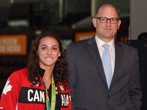 Olympic medallist Kylie Masse and Windsor Mayor Drew Dilkens attend a media conference at the WFCU Centre for the FINA  World Swimming Championships on Friday, Sept. 30, 2016.  Masse was named the event's ambassador.