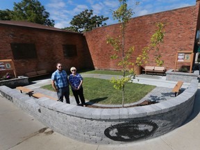 T.J. Auer, community planner with the Ford City Renewal Project and Marina Clemens, executive director of Drouillard Place stand in the Stan Ribee Parkette on Tuesday, Sept. 20, 2016. The newly opened parkettte is located at Drouillard Road and Richmond Street.