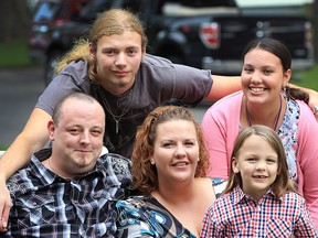 Tim and December Gibson are shown with their children Tristen, 17, Lilly, 12, and Grason-David, 4, at their Windsor home on Tuesday, Aug. 30, 2016. All three children will attend the new JK-12 Herman secondary school.