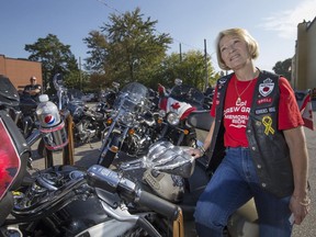 Theresa Charbonneau, mother of the late Cpl. Andrew Grenon, prepares for the annual Cpl. Andrew Grenon Memorial Ride at the Royal Canadian Legion in Tecumseh Sunday, September 18, 2016.