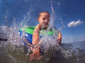 James Walsh, 4, cools off at Sandpoint Beach on July 27, 2016.