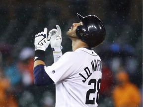 Detroit Tigers' J.D. Martinez reacts was traded to the Arizona Diamondbacks on Tuesday for three minor-league players.