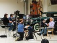 Jay Leno, right, is filmed for Live Another Day, a documentary about the U.S. government bailout of General Motors and Chrysler in 2008-09.