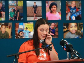 An emotional Nicole Abdul-Massih, mother of patient Ethan, speaks about the heartbreaking challenges of having a child with cancer. The Windsor Regional Hospital held a news conference on Wednesday, Sept. 14, 2016, to recognize Childhood Cancer Awareness Month. Several families with children with cancer attended the event at the Met campus.