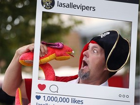 LaSalle councillor Jeff Renaud has some fun dodging a stuffed viper during LaSalle Vipers Tailgate Party at Vollmer Centre on Wednesday, Sept. 14, 2016.