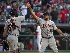 Detroit Tigers relief pitcher Francisco Rodriguez, right, is congratulated by catcher James McCann after defeating the Cleveland Indians in Cleveland, Sunday, Sept. 18, 2016.