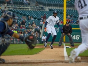 Cameron Maybin (4) of the Detroit Tigers leads off third base in the first inning during an MLB game against the Minnesota Twins at Comerica Park on Sept. 14, 2016 in Detroit, Mich.