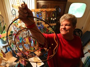 LaSalle’s Donna Hebert displays some of her hand-crafted dream catchers that will be part of the Sandwich Town Festival this weekend.