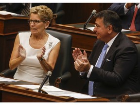 Ontario premier Kathleen Wynne along with Lieutenant Governor of Ontario, The Honourable Elizabeth Dowdeswell entre the Ontario Legislature at Queens park for the reading of the Throne Speech on Monday September 12, 2016. Dave Thomas/Toronto Sun/Postmedia Network