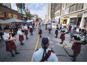 WINDSOR, ONT: SEPTEMBER 18, 2016 -- The Essex and Kent Scottish Regiment Pipes and Drums perform downtown during Open Streets Windsor Sunday, September 18, 2016.  This is the second Open Streets Windsor event, where a long stretch of road is closed to automobile traffic from Olde Sandwich to Ford City.  (DAX MELMER/The Windsor Star)