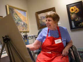 Windsor artist Vivian Klinck works on a painting in her studio during the 6th annual Open Studio Tour organized by the Arts & Cultural Alliance of Windsor-Essex County, Sept. 24, 2016.