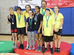 Several L'Essor wrestling team members qualified and represented the South Western Ontario regional team for the 2016 Ontario Summer Games in Mississauga. The men's team won an overall bronze team medal at the event. From left: Logan Renaud, Gabriel Sementilli, Sophie Leboeuf, Chloe, Virgnie Gascon, coach Shayne Bernie, Hunter Dalgetty, Selena Renaud.