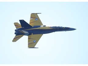 The Canadian Forces CF-18 Hornet performs at the 67th annual Canadian International Air Show (CIAS) soared over Lake Ontario and the CNE on the Labour Day weekend.  Sunday September 4, 2016. Jack Boland/Toronto Sun/Postmedia Network