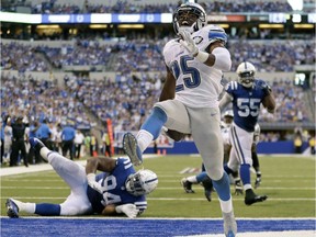 Detroit Lions running back Theo Riddick (25) celebrates as he runs in for a touchdown against the Indianapolis Colts during the first half in Indianapolis, Sunday, Sept. 11, 2016.