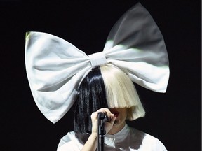 Sia will perform at the Palace of Auburn Hills on Oct. 15. She's shown on stage during an Apple event at Bill Graham Civic Auditorium in San Francisco on Sept. 7, 2016.