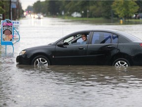 A young driver seeks help after her car stalled on Lesperance Road near Riverside Drive on Sept. 29, 2016, in Tecumseh, Ont.