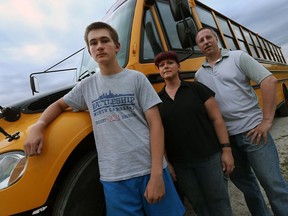 Ryan Ouellette is pictured with his parents Lisa and Don Ouellette in Windsor on June 9, 2016. The family has been critical of the fact that the Catholic school board does not offer busing to city high school students.