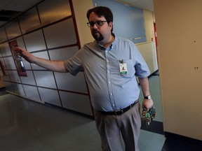 Ron Dunn, executive director of the Downtown Mission, leads a tour of their new building at 875 Ouellette Ave., in Windsor on Monday, May 2, 2016.