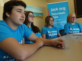 Tecumseh Vista students Dane Tiberia, left, Abbey Brown, Chloe Boutros and Alyssa Cusenza discuss suicide prevention week issues on Sept. 13, 2016.