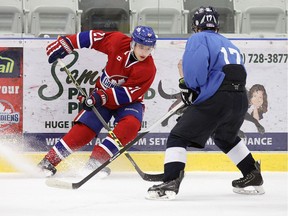 Lakeshore Canadiens forward Jake Nimmo, seen at left earlier in the season against Wheatley, helped his club rally for a 5-4 win over the Petrolia Flyers on Friday at the Atlas Tube Centre.