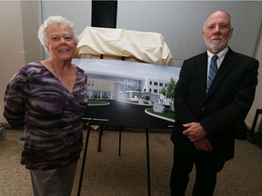 Thom Rolfe, Executive Director of Hiatus House, is joined by original executive director Donna Miller, ;eft, at the 40th anniversary party at the St. Clair Centre for the Arts in Windsor on Thursday, September 22, 2016. Plans for the new Leamington facility were unveiled.