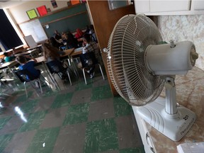Teachers use fans at Marlborough Public School in Windsor to try to beat the heat on Sept. 6, 2016.