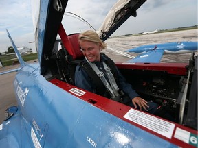 Star reporter Kelly Steele may look relaxed but she's a bundle of nerves as she prepares for her flight in a Lockheed T-33 at the Windsor Airport in Windsor on Friday, Sept. 9, 2016.