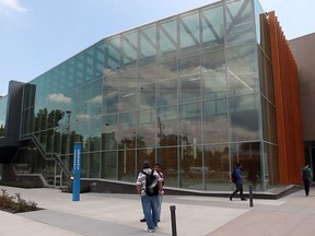 University of Windsor students walk outside Ed Lumley Centre for Engineering Innovation on May 30, 2013.