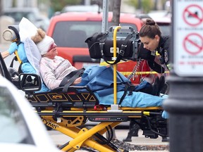 A elderly woman is transported to hospital after being stabbed on Ottawa Street near Hall Avenue in Windsor, Ont., on Sept. 28, 2016.