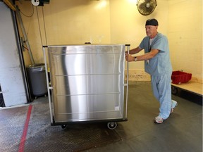 Thom Morris, Windsor Regional Hospital operations manager of the medical devices reprocessing department, loads a truck of sterilized medical devices to be delivered to Leamington District Memorial Hospital on Sept. 9, 2016.