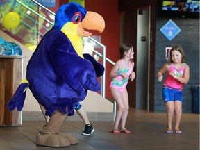 Youcan the Toucan dances with Shayla Pelchat, 8, left, and Zoe Galla, 7 during a Zumba class on Sept. 23, 2016 at the Adventure Bay Family Water Park.