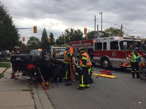 Emergency crews on the scene of a rollover near Wyandotte Street and Campbell Avenue in Windsor on Oct. 18, 2016.