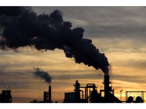 A cloud of pollution released by an industry. Photo by Getty Images.