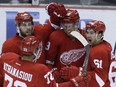 Detroit Red Wings forward Anthony Mantha, centre, is congratulated by teammates after scoring a goal on Toronto Maple Leafs goalie Frederik Andersen during the third period of an NHL preseason hockey game on Oct. 8, 2016 in Detroit.