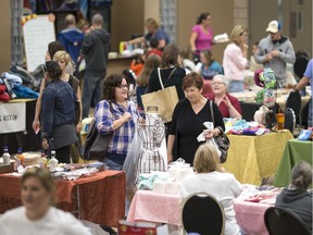 Craft lovers browse through the vendors at the fourth annual Handmade Fall Extravaganza at the WFCU Centre, Saturday, Oct. 1, 2016.