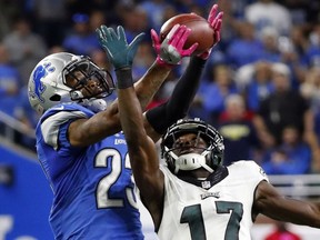 Detroit Lions cornerback Darius Slay (23) intercepts a pass intended for Philadelphia Eagles wide receiver Nelson Agholor (17) on Sunday, Oct. 9, 2016, in Detroit.