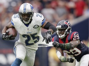 Andre Hal #29 of the Houston Texans grabs the jersey of Theo Riddick #25 of the Detroit Lions in the fourth quarter at NRG Stadium on October 30, 2016 in Houston, Texas.