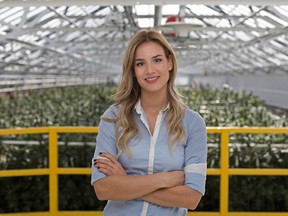 Sarah Dobbin, professional outreach manager at Leamington medical marijuana producer Aphria, stands in one of the company's greenhouse facilities on Oct. 28, 2016.