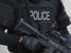A member of the Windsor police Emergency Services Unit (ESU) stands at the ready with tactical gear in this 2014 file photo.