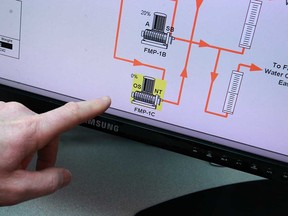 A computer screen at the Weeks Water Treatment Plant in Windsor shows that water fluoridation is out of service in this March 2013 file photo.