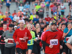 Thousands of runners participate in the Detroit Free Press/Talmer Bank Marathon as they run along Riverside Drive West in Windsor on Oct. 20, 2013.