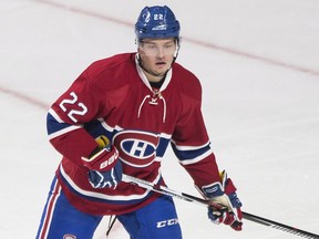 Montreal Canadiens' Mikhail Sergachev looks for a pass during an NHL pre-season game against the Ottawa Senators in Montreal on Sept. 29, 2016.